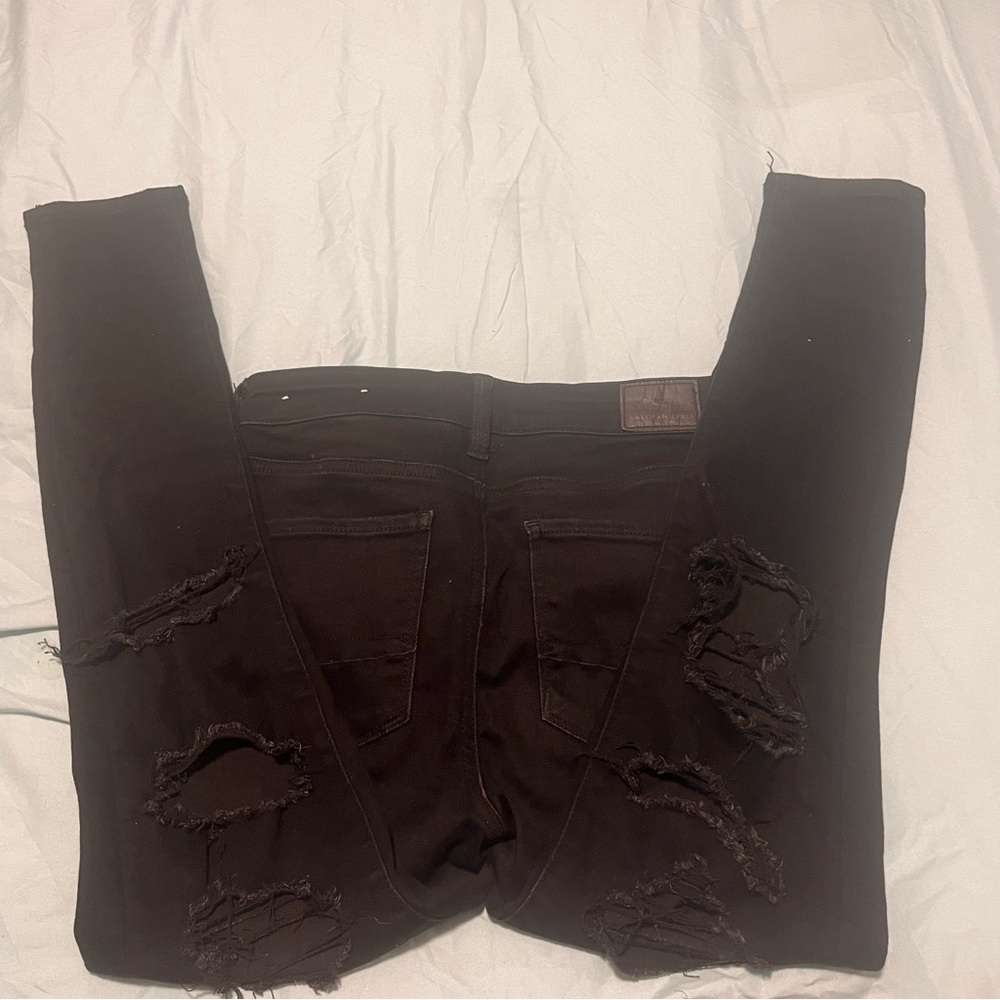 black distressed american eagle jeans